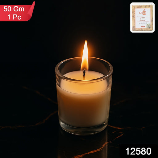 Close-up of the soy blend wax and cotton wick inside the glass votive candle.