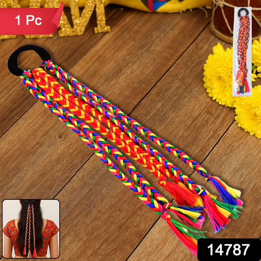Close-up of colorful braided hair extension with tassels for traditional styling