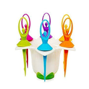 The elegant dancing doll stand holding the six reusable fruit picks, ready for use.