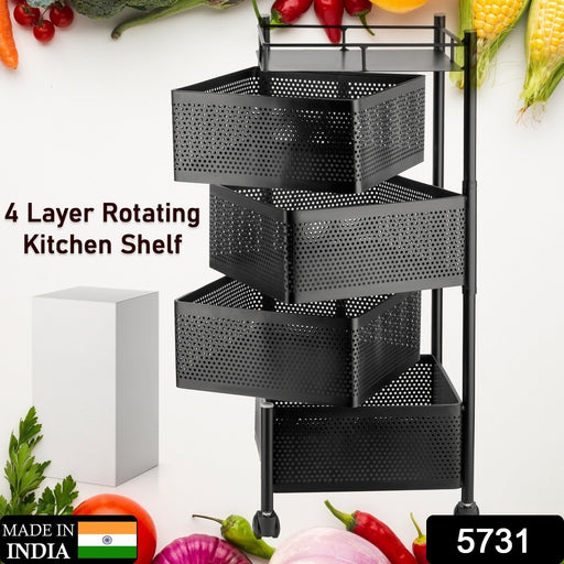 Close-up of the rotating metal mesh basket on the kitchen trolley, showing its ventilation.