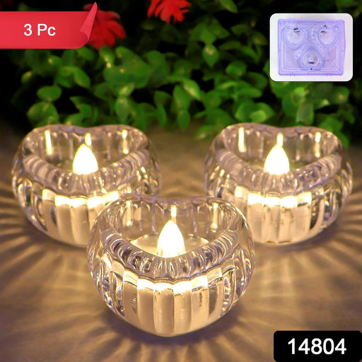 Close-up of heart-shaped LED flameless candles glowing softly