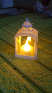 Arrangement of multiple flameless LED lanterns for a festive ambiance.