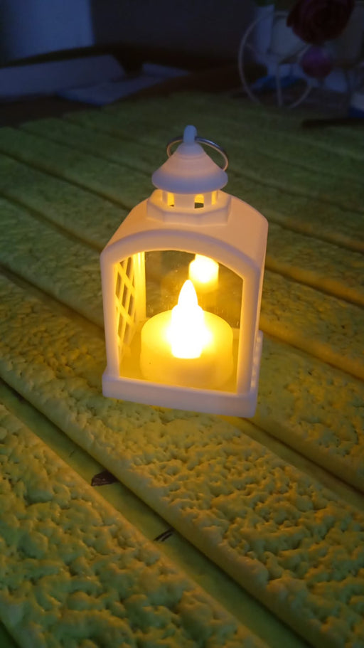 Arrangement of multiple flameless LED lanterns for a festive ambiance.