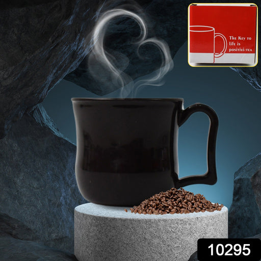Ergonomic black plastic coffee mug, highlighting its comfortable handle and grip.