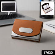 Business card holder with secure magnetic flap closure in brown leather