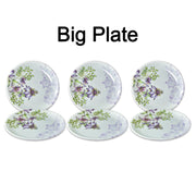 High-quality 32-piece plastic tableware set displayed on a table.