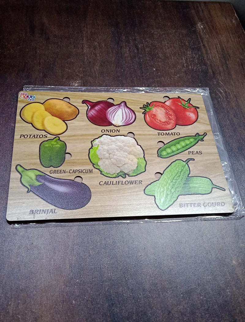 Close-up of smooth, chunky wooden vegetable puzzle pieces, safe for little hands.
