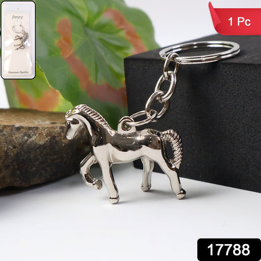 Elegant horse-shaped metallic keyring holding car and home keys
