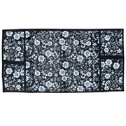 Top view of a microwave cover showcasing its functional design and fabric texture.