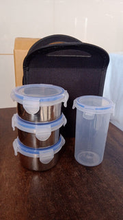 Complete 4-piece stainless steel tiffin set with sleek design for daily use.