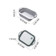 Space-saving foldable chopping board collapsed for compact storage in a small kitchen.