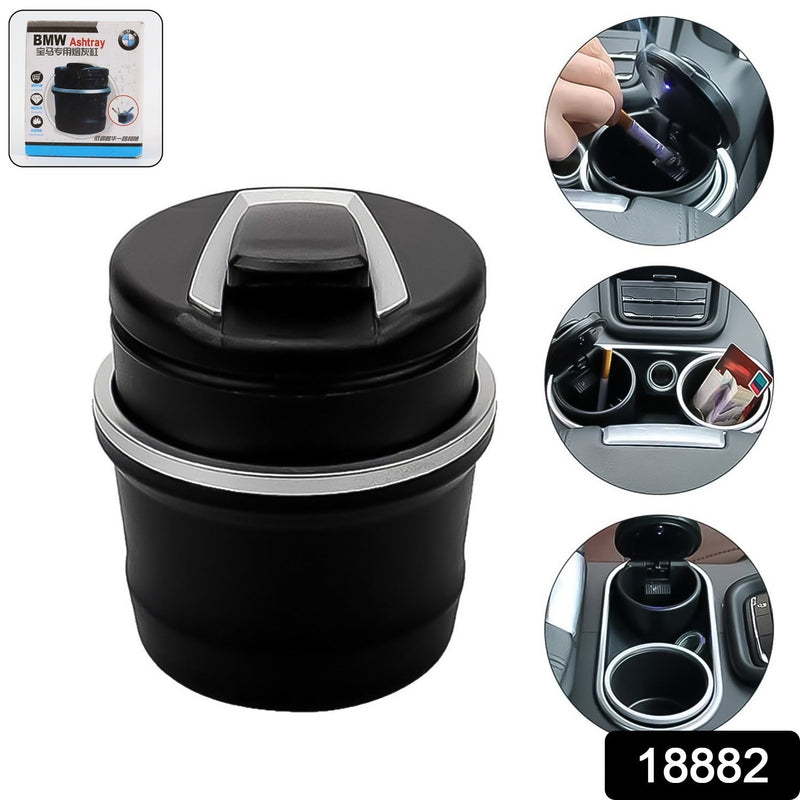 Car ashtray showing lid open for ash disposal