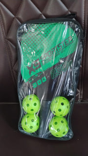 Konex pickleball paddles and balls displayed on an outdoor court for recreational play