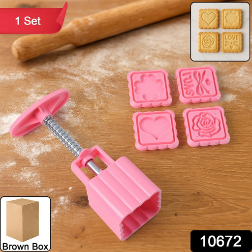 Close-up of biscuit stamp mold set showing 4 interchangeable decorative stamps