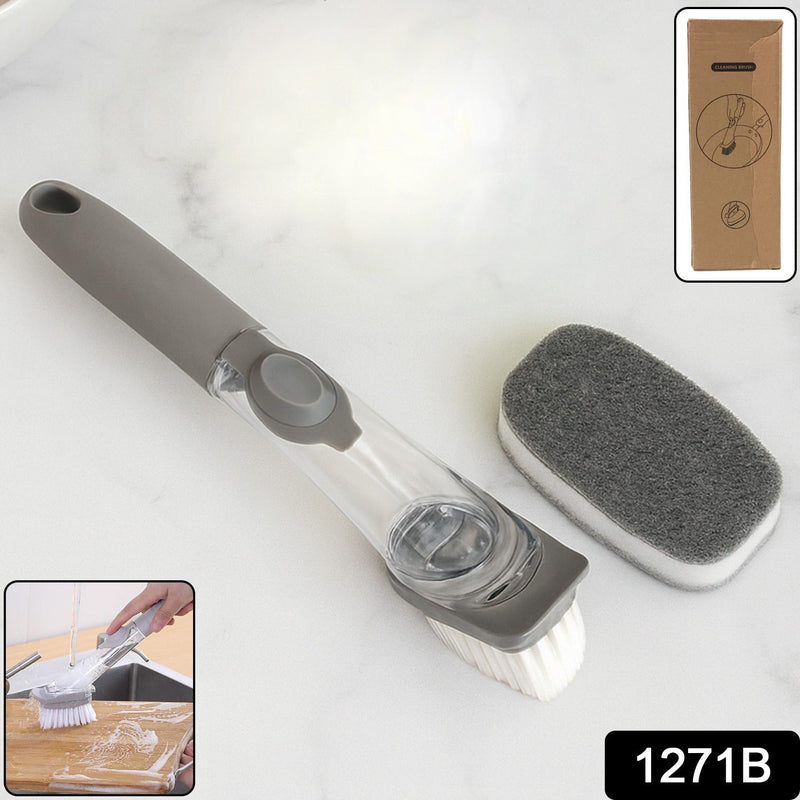 Close-up of the soap-dispensing dish brush featuring the interchangeable scrub sponge head