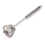Versatile stainless steel hand blender mixing ingredients in a bowl.