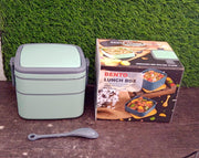 The green stackable tiffin box displayed with its matching spoon.