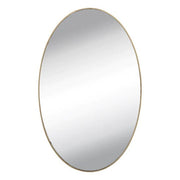 Installation view of an oval mirror wall sticker being applied to a smooth surface.