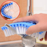 The flexible cleaning brush featuring its convenient hanging hook for space-saving storage.