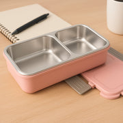 BPA-Free lunch box featuring built-in cutlery slot holding a spoon