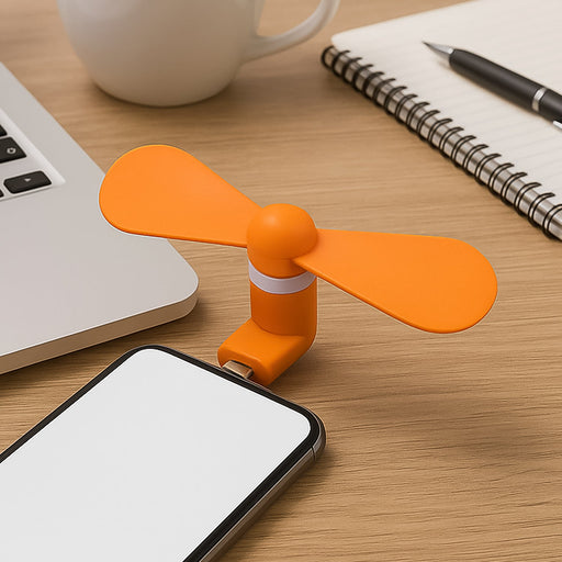 VoltDesk Mini USB fan providing instant personal cooling.