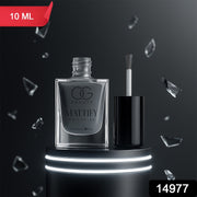 Hand applying Calm Grey Matte Nail Polish for an elegant, modern look.