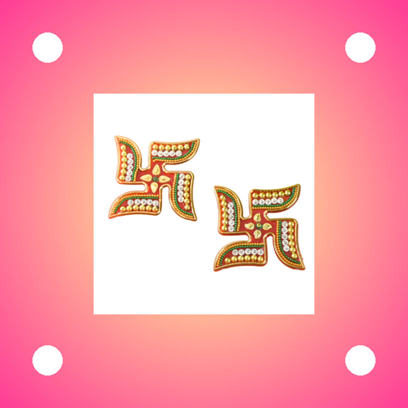 Acrylic Swastik stickers showcasing detailed bead and rhinestone craftsmanship
