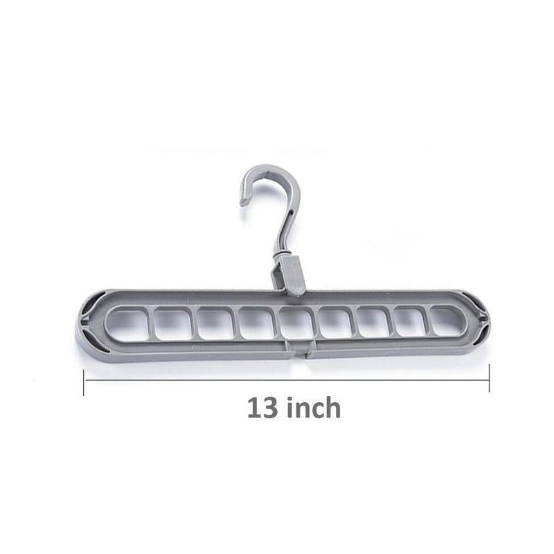 Close-up view of the nine precisely designed holes on the plastic hanger for secure garment storage.