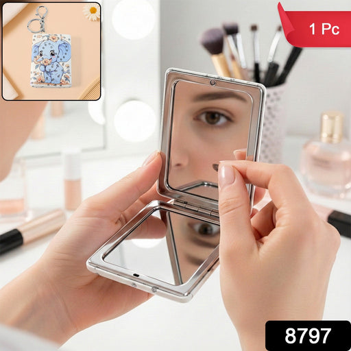 Close-up view of beauty mirror keychain with compact folding design