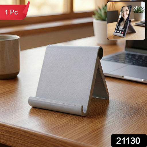 Foldable phone stand holding smartphone at an ergonomic viewing angle