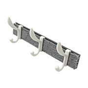Wall mounted coat rack showcasing its sturdy metal hooks and elegant wooden base