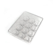 Hand placing an egg into the 12-cavity egg organiser for neat storage.