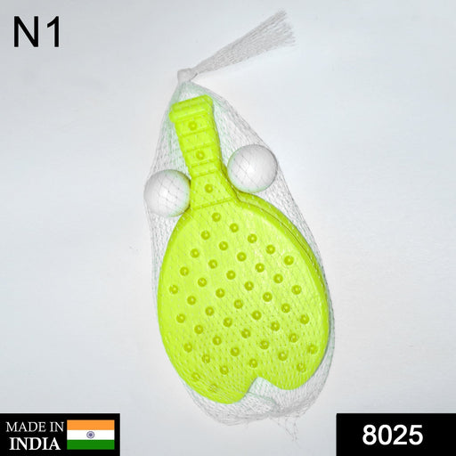 Close-up of a colorful plastic table tennis racquet and ball for children's enjoyment.