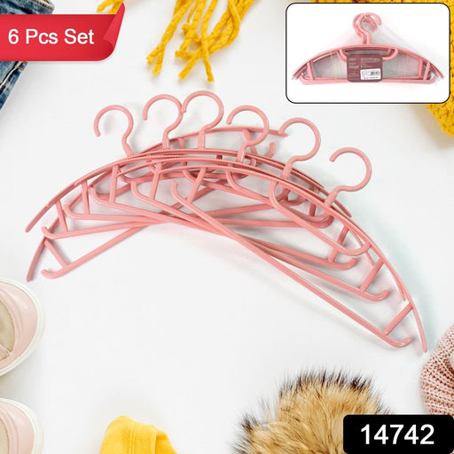 Close-up of plastic cloth hangers with non-slip grooves for sarees and dresses