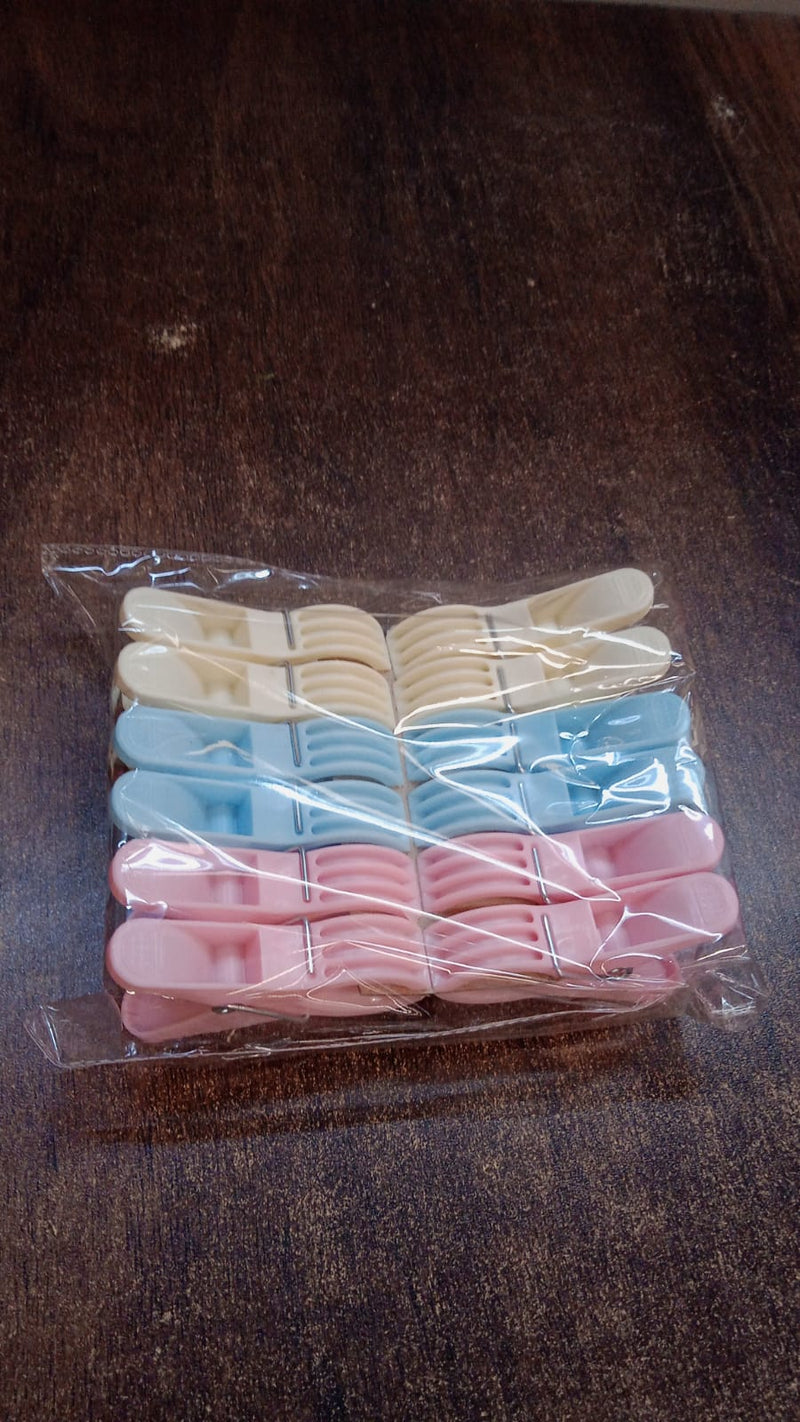 Colorful plastic cloth clips arranged neatly in rows for easy selection