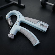 Angled view of hand gripper fitness tool