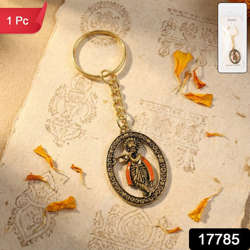 Traditional Lord Krishna metal keychain displayed on surface