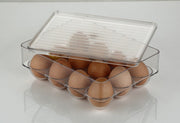 Stackable egg storage box with 12 compartments, shown empty.