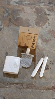 Complete portable toilet brush set with a wall hook accessory.