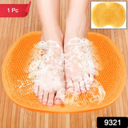 Yellow bath mat made of silicone with anti-slip suction cups fixed on bathroom floor