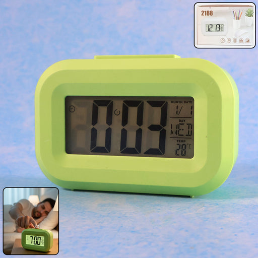Digital alarm clock showing time, date, day, and temperature clearly on display