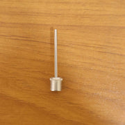 Ball pump needle adapter in use with sports ball pump