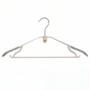 Space-saving plastic hangers for closet organization