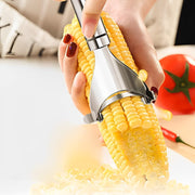 Close-up of serrated blade on stainless steel fruit and vegetable peeler