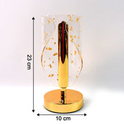 Contemporary crystal lamp with metal base and stylish golden leaf design