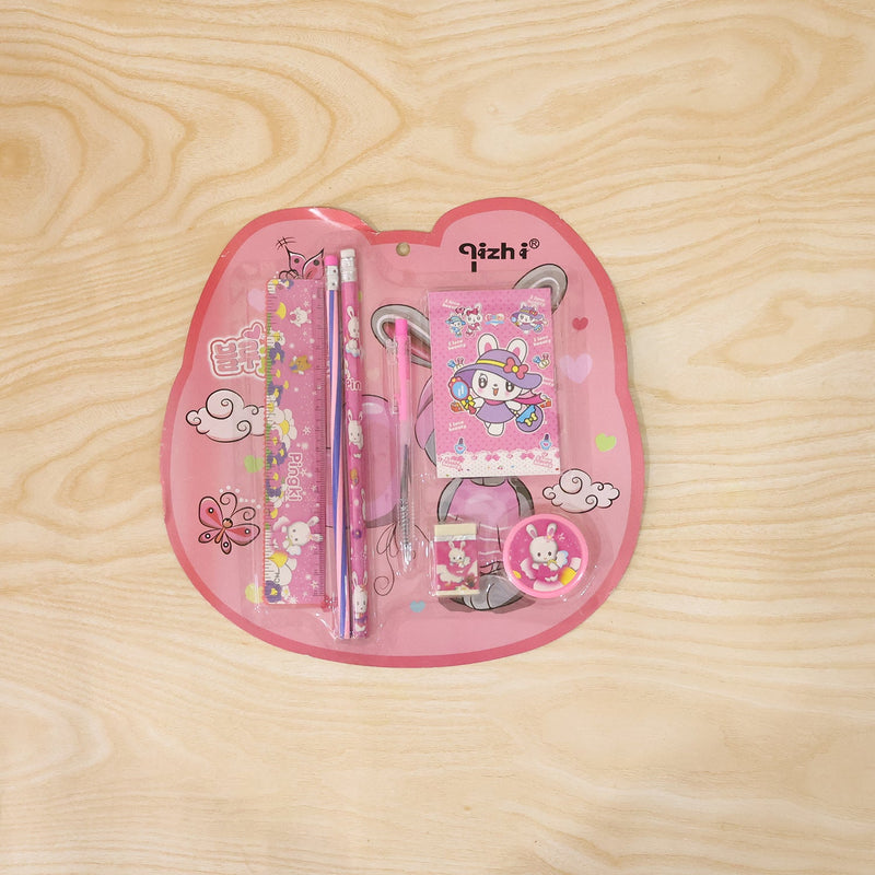Pink kids stationery set displayed with all included items