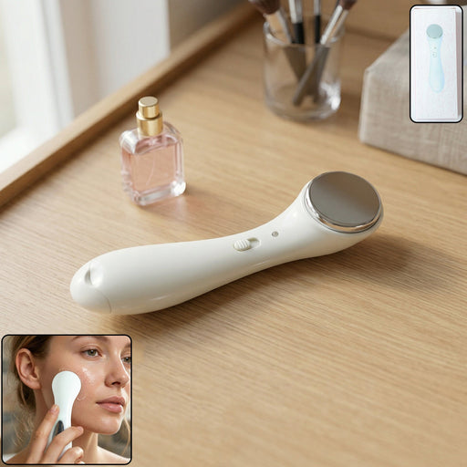 Angled view of portable facial massager device