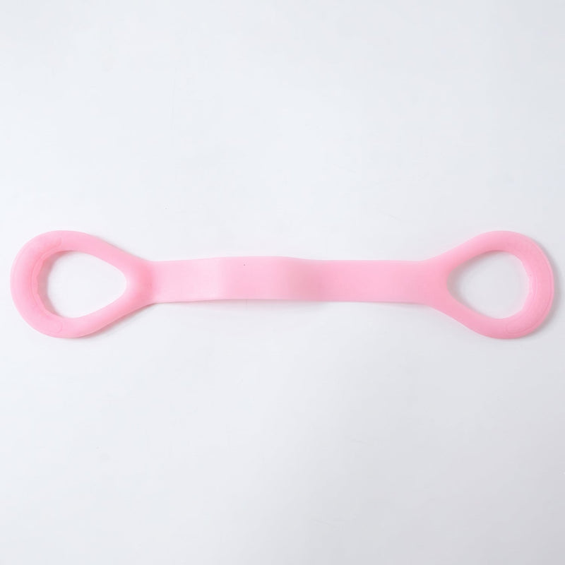Woman using resistance band for arm exercises during workout
