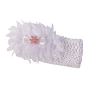Baby headband displayed, highlighting lightweight and stretchable fabric