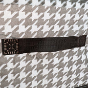 Detail shot of the canvas storage basket showing its reinforced steel support structure for durability.